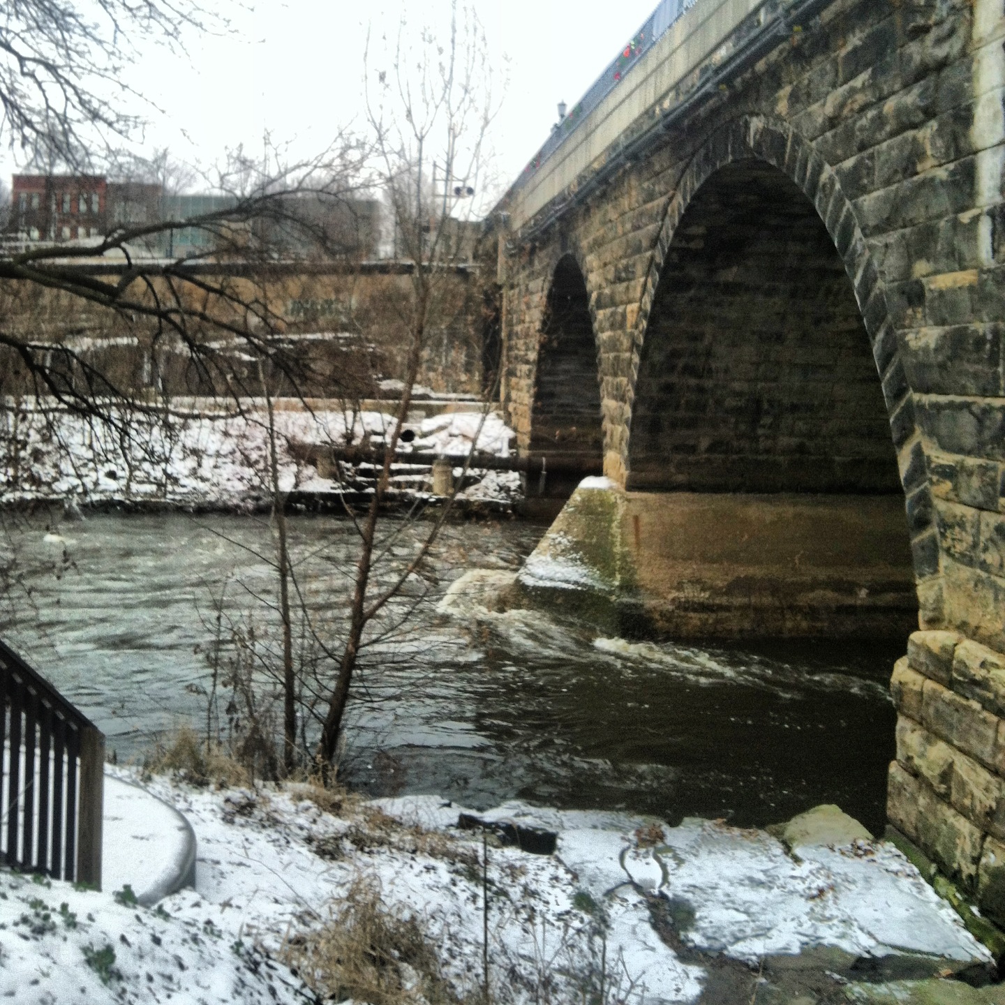 The Kent, Ohio bridge is surrounded by snow in winter.